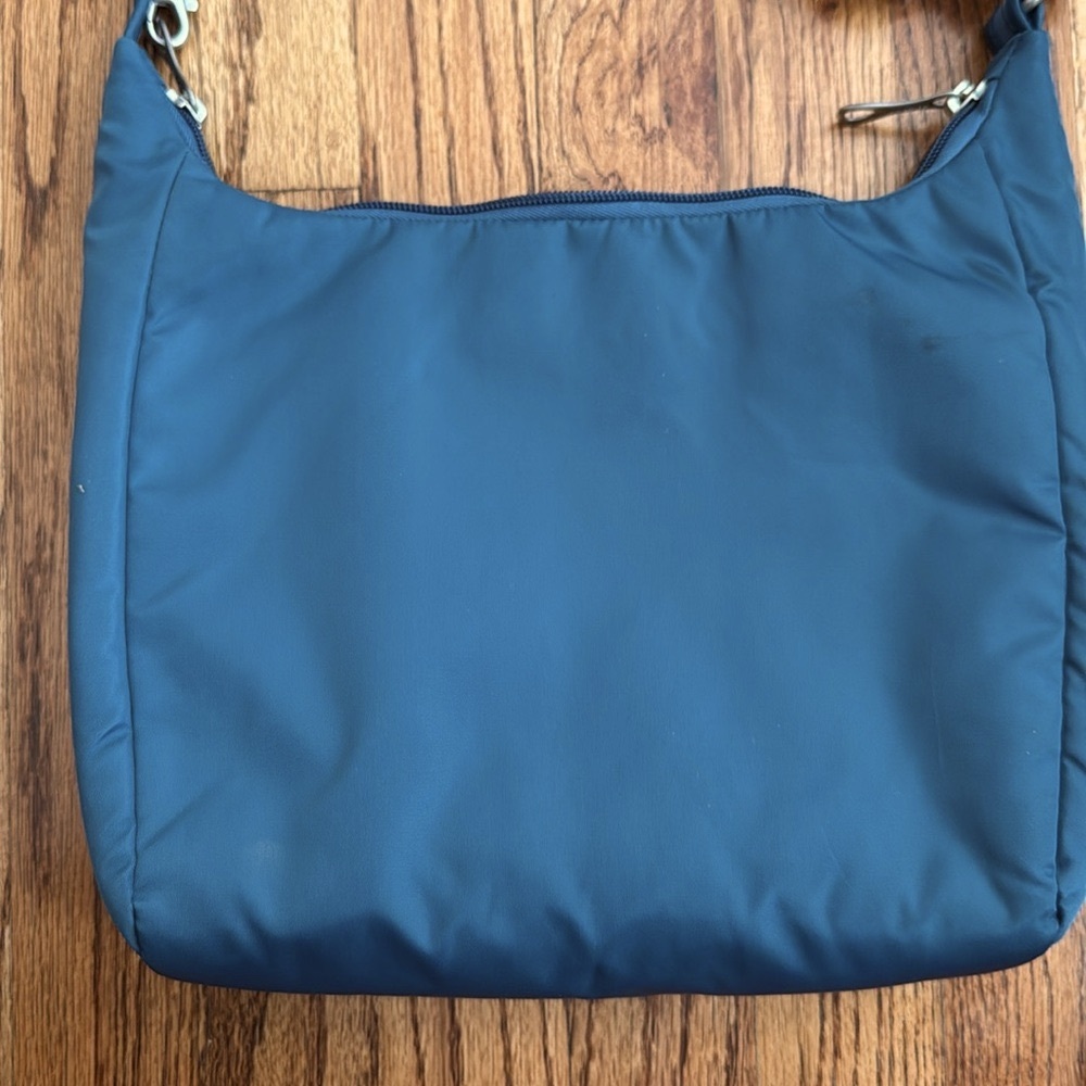 Pacsafe Antitheft Crossbody bag  Citysafe CS series in Tidal Teal - Picture 2 of 11